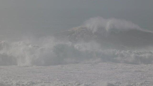 Big waves crushing in winter season in Nazare, Portugal