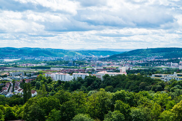 Fototapeta premium Germany, Aerial view over Stuttgart Killesberg rooftops towards scenic Neckar valley landscape