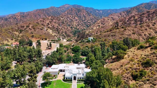 Rising over El Miradero Brand Library and Art Center. View on the Verdugo Mountains in Glendale, California, USA.