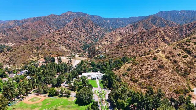 Mountains with scarce greenery in Glendale, California, USA. View on the Library and Art Center in Brand Park.
