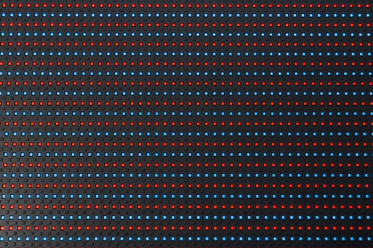 Flat View of a Micro Etched Glass Matrix Pane with Regular Arrays of Glowing Crimson and Cyan Nano Light Nodes.