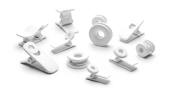 Assortment of silver-colored metal hardware components including screws, nuts, washers, and bolts scattered on a white background
