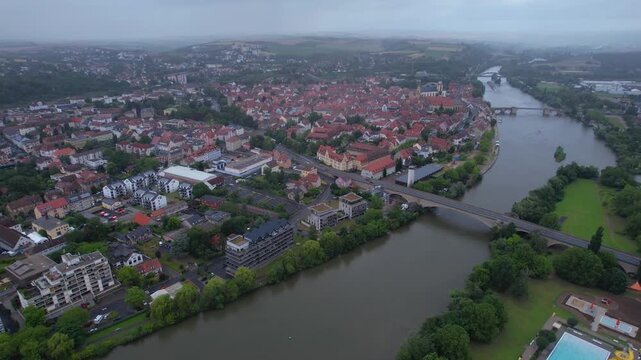 Aerial panorama view of the old town of the city Kitzingen during an cloudy summer day in Bavaria, germany	