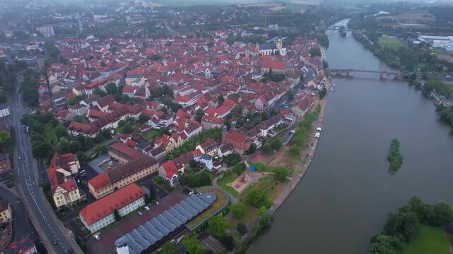 Aerial panorama view of the old town of the city Kitzingen during an cloudy summer day in Bavaria, germany	
