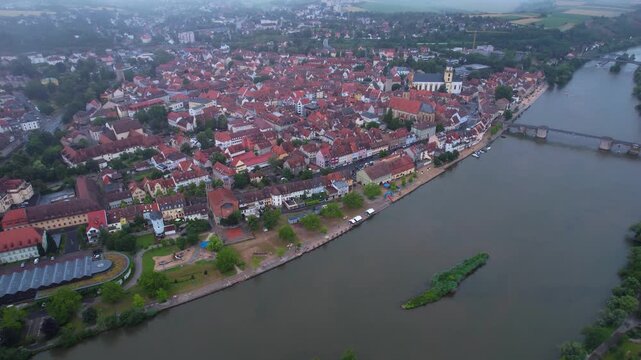 Aerial panorama view of the old town of the city Kitzingen during an cloudy summer day in Bavaria, germany	