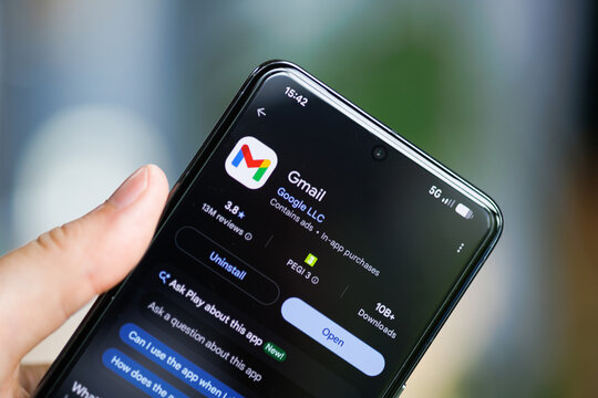 Smartphone displaying the Gmail app on the Google Play Store