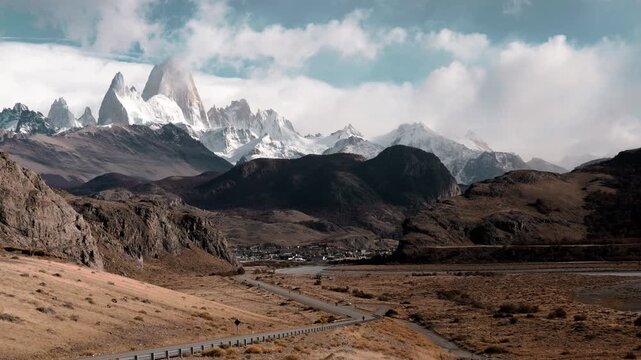Mount Fitz Roy Over El Chalten with Runner on Scenic Road
