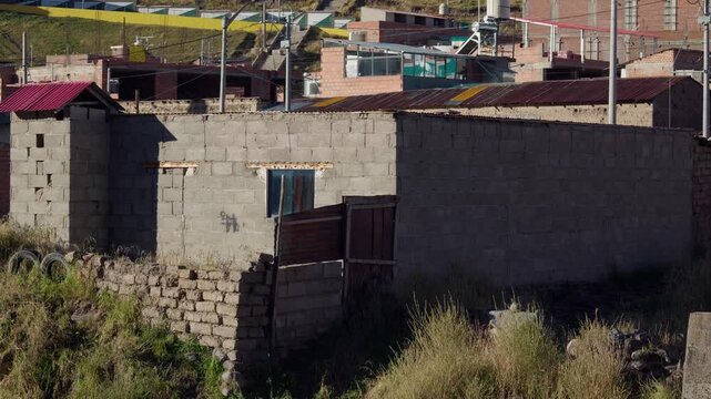 Traditional rustic adobe house built on a high mountain area.