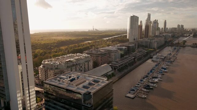 Sunrise Drone View of Puerto Madero Skyline and Ecological Reserve in Buenos Aires