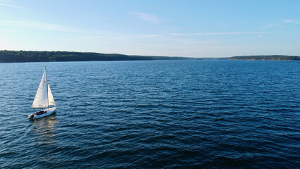 Fototapeta premium Aerial Sailboat Maine Coastal Bay Wide Open Water Drone
