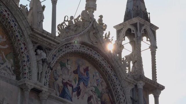 Sunrise Glow on Ornate Cathedral Facade in Venice