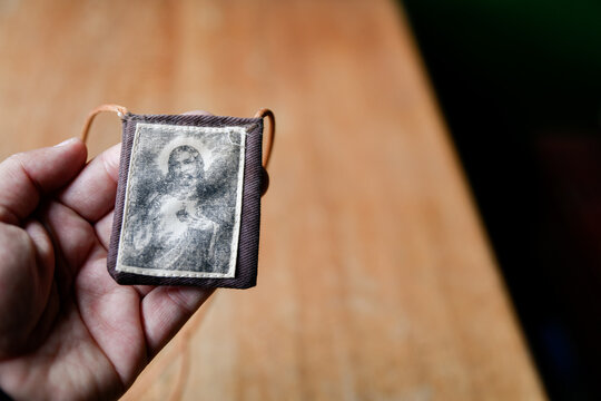 Sacred Heart Catholic scapular held in hand