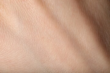 Fototapeta premium Texture of normal skin as background, closeup