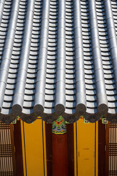 High angle view of traditional grey roof tiles pattern on an ancient korean building