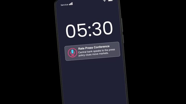 Smartphone screen displaying a rate press conference notification at 05:30 with central bank policy clues