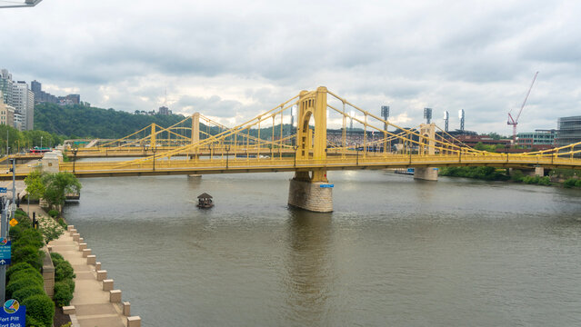 A scenic wide shot captured from an elevated perspective, showcasing Pittsburgh&rsquo;s iconic "Three Sisters" bridges&mdash;specifically the Roberto Clemente (Sixth Street) and Andy Warhol (Seventh Street) Bridg
