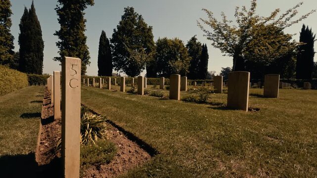 Rows Of Gravestones In Peaceful Cemetery