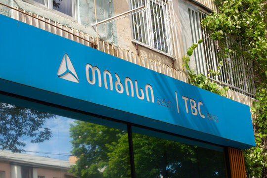 Tbilisi, Georgia - May 19, 2026: Street photo. TBC bank logo on blue wall. Concept of payment, terminal machine cash money, ATM, loan, debt, pay tax, plastic card, salary, credit, budget, salary