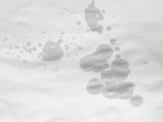 Wet paper. Wet spots on paper. Blank sheet © Alex Puhovoy