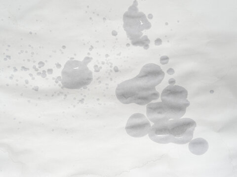 Wet paper. Wet spots on paper. Blank sheet