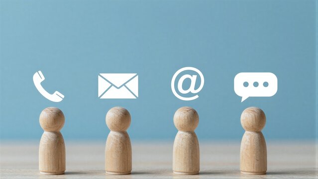 Four wooden figures represent different communication methods: phone