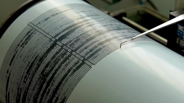 A seismograph is recording volcanic activity. A seismograph is an instrument for recording earthquakes.