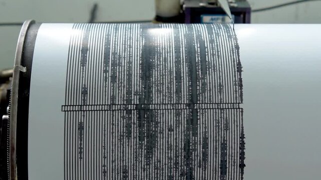 A seismograph is recording volcanic activity. A seismograph is an instrument for recording earthquakes.