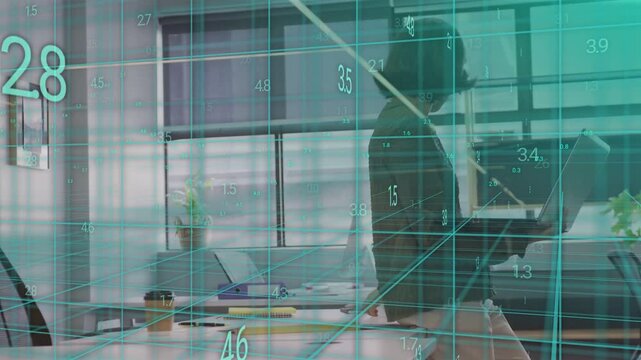 Woman at desk opening laptop, flipping documents for business analysis with cyan grid overlaying