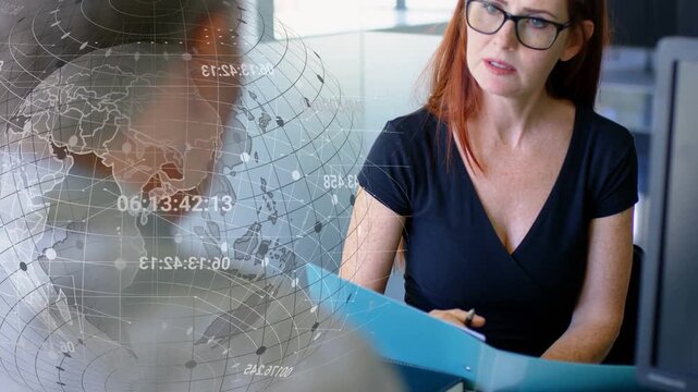 Woman reviewing blue folder in business meeting, globe obscuring man extending hand closing deal