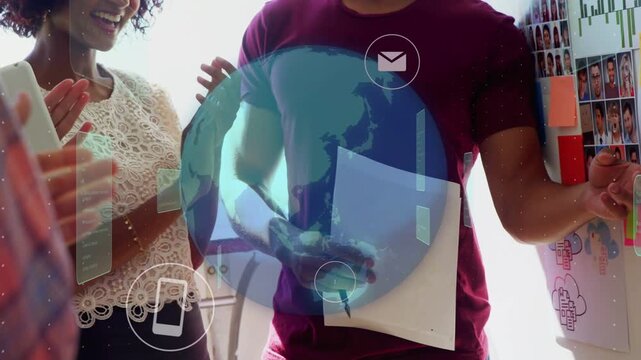 Man pointing at board, presenting and noting tech roadmap, team clapping, AR globe overlaying group