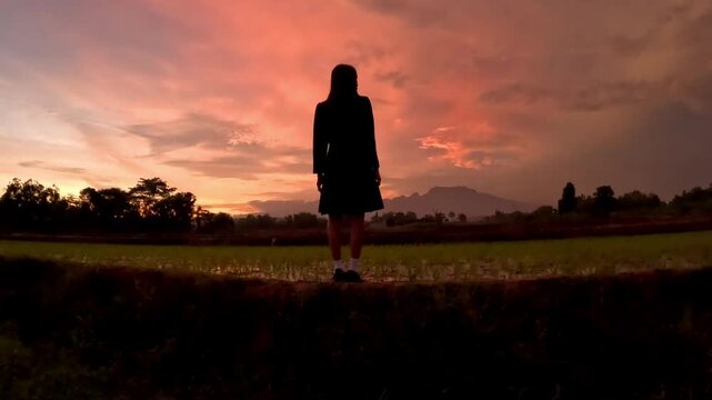 Silhouette of an Asian woman in the afternoon. Introverted woman. World Introvert Day.