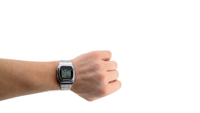 electronic digital watch on wrist of male hand on white background