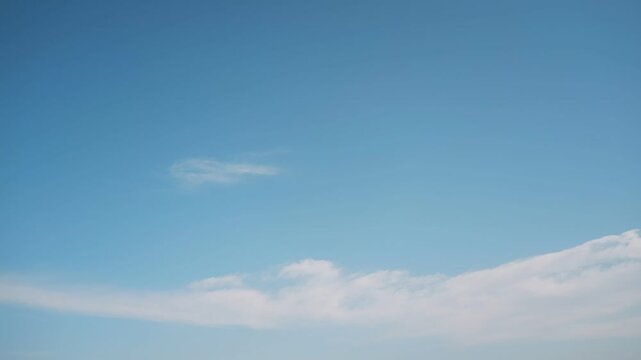 Beautiful blue sky with distant thin clouds and gradient