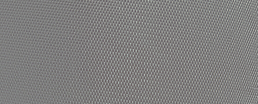 Industrial gray carbon fiber texture, metallic silver honeycomb pattern background, sleek technical mesh surface for automotive and tech design