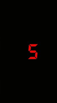 A red digital countdown video (from 10 seconds to 1 second) stands out against a black background.