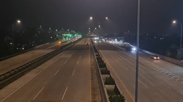 Busy Highway Toll Road at Night in Depok Indonesia for Transportation and Urban Logistics Background