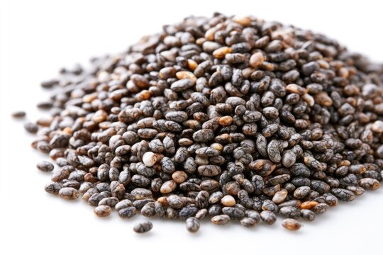 A close-up image of a pile of chia seeds on a white background, highlighting their small, oval shape and speckled black, white, and brown colors.