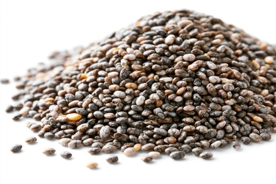 A close-up image of a heap of small, oval chia seeds with a mix of black, brown, and white colors on a white background.