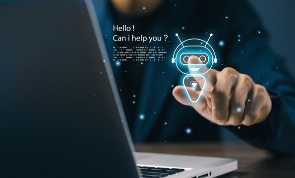 Businessman interacting with virtual AI chatbot assistant on laptop, featuring artificial intelligence customer support, automation technology and futuristic digital communication.