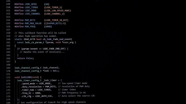 Coding programs on black screen background.