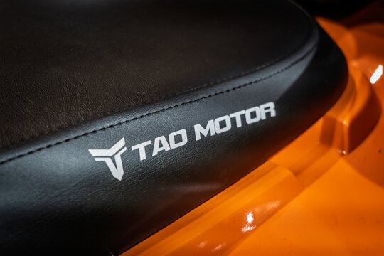BELGRADE, SERBIA - MARCH 22, 2026: Tao Motor logo on a black seat on a utility vehicle, in belgrade. Tao Motor is a chinese manufacturer of powersports vehicles, ATV, UTV, SXS, Quads.
