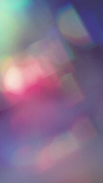 Vertical video. Blur prism light. Reflection ray. Gradient bokeh colorful sparks motion. Rotation mix lens neon luminosity abstract defocused background.