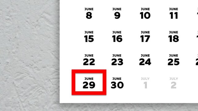 The date June 29th marked with a red cursor on the wall calendar 2026