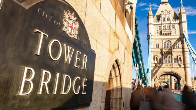Tower Bridge in London, UK, United Kingdom. Time lapse. People walking.