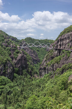 Ruyi Bridge Across Canyon in Shenxianju Scenic Area, Mountain Valley Landscape in Taizhou Zhejiang China