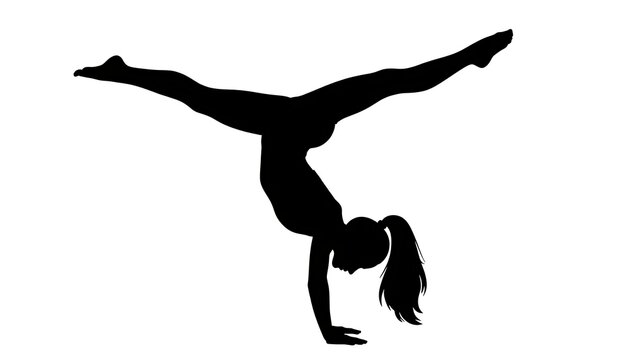 A girl in a handstand position with legs split apart