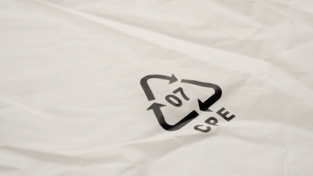 Recycle symbol 07 CPE on white plastic bag, environmental conservation and plastic waste concept