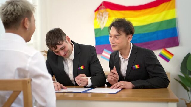 Same sex couple attending marriage registration meeting together with joyful expressions and rainbow Pride symbols