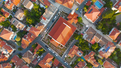 Fototapeta premium Antalya, Turkey. Aerial drone view of Kaleici Old Town streets featuring Kesik Minaret, Sehzade Korkut Mosque and ancient church in morning light.. Aerial View