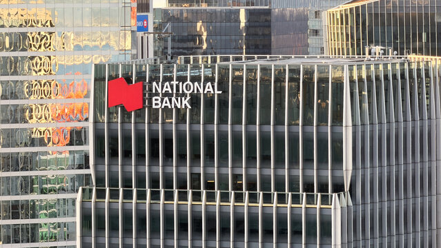 Vancouver , Canada - January 2026: National Bank of Canada logo and signage on modern glass office tower skyscraper in downtown Vancouver financial district